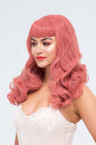 Long pastel-pink pinup style wig with gentle waves and short fringe: Candy