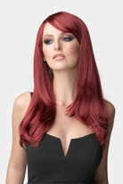 Long red wig in razor cut, face frame style: Megan