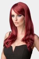 Long red wig in razor cut, face frame style: Megan